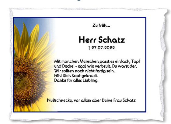 Screenshot einer Traueranzeige. Links eine blühende Sonnenblume sonst schwarzer Text. 
